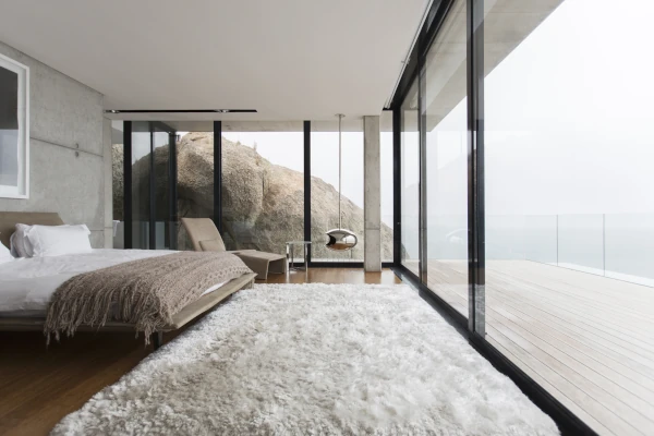 Bedroom with glass facade